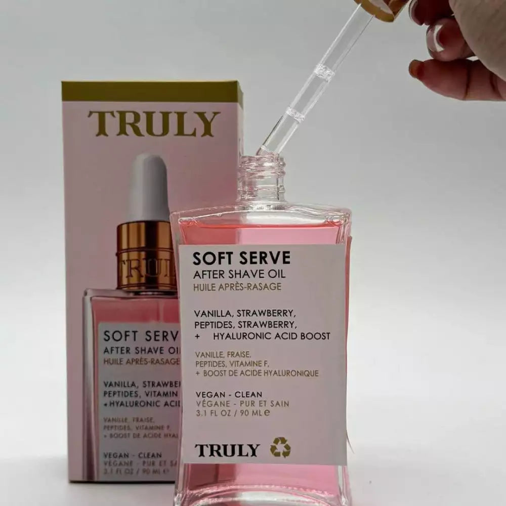TRULY ROSADO Y CAJA DE PROTECCIÓN ACEITE INTIMO ACLARANTE